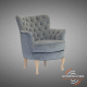 Fauteuil capitonné gris individuel